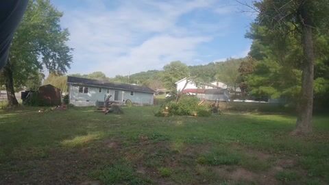GoPro time-lapse of cutting the tree into chunks once it was down on the ground, loading it in the truck, and hauling it away